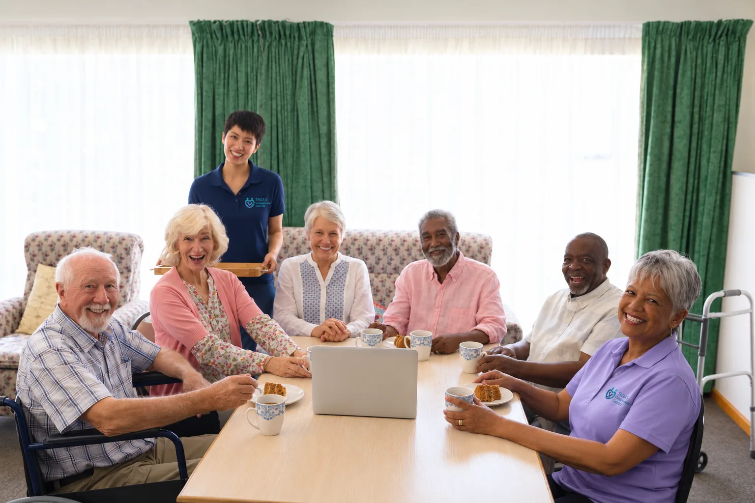 Support workers serving coffee to older adults gathered round a table